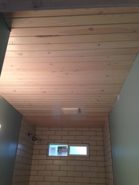 White-washed tongue and groove pine ceiling.